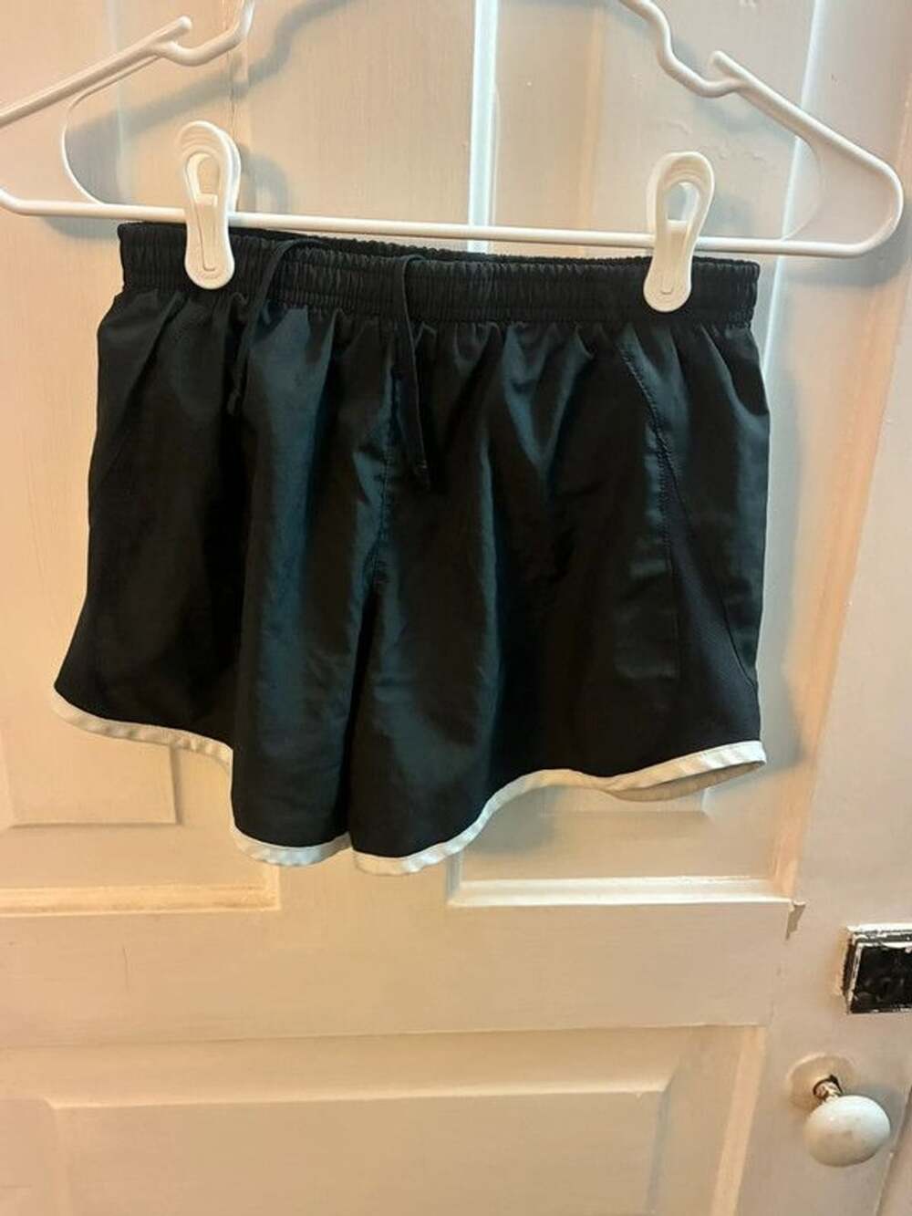 Nike black shorts with white trim youth L